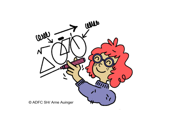 Eine Frau malt mit einem Stift ein Fahrrad und Symbole an eine Wand